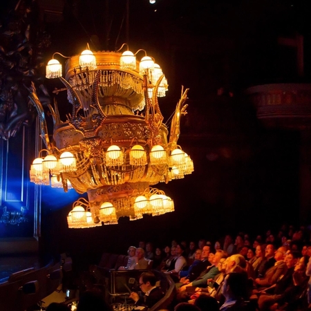 grand stage design and chandelier scene